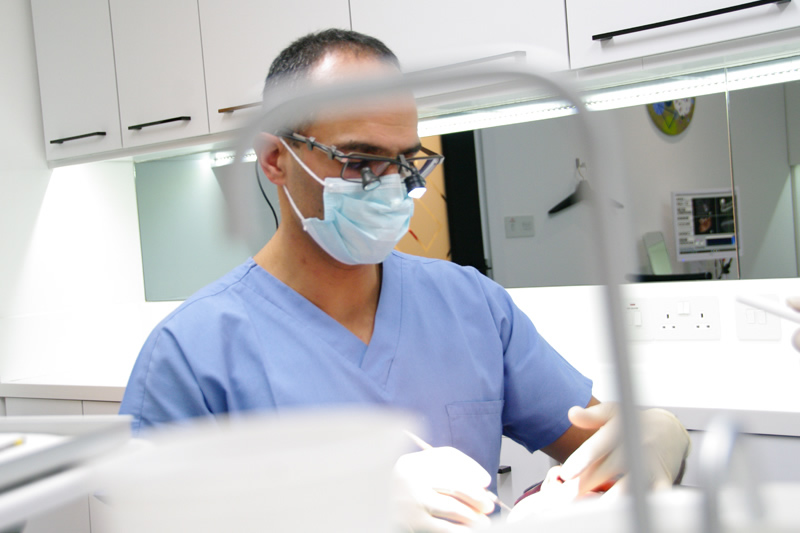 Dr Sanei wearing dental loupes